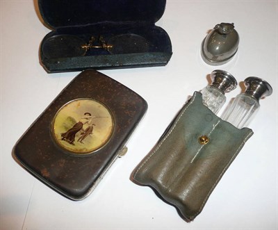 Lot 8 - A pair of glass scents with pique-work lids, a novelty tape measure, a cigarette tin depicting...