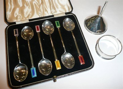 Lot 18 - Six silver enamel spoons, napkin ring and a hip flask funnel