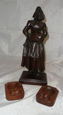 Lot 21 - A Black Forest carved model of a woman and two 'Mouseman' ashtrays