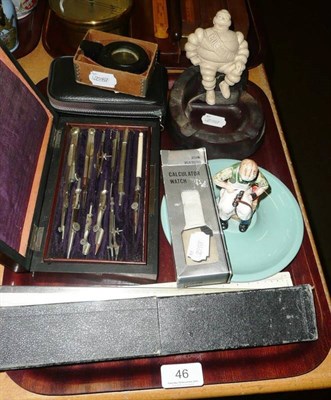 Lot 46 - Michelin Man promotional ashtray, a cased set of drawing instruments, a World War II issue compass