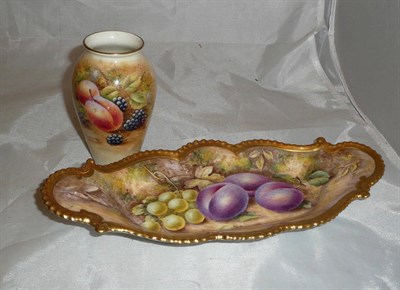 Lot 100 - A Royal Worcester baluster vase painted with fruit, signed Smith, and a similar oval dish,...