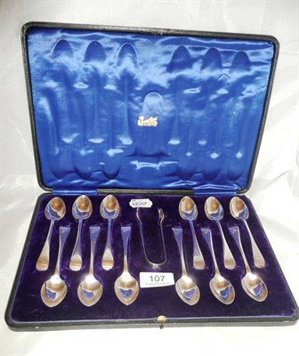 Lot 107 - Cased set of twelve silver teaspoons and tongs, 6.5oz