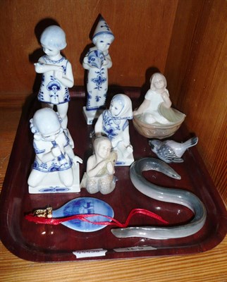 Lot 109 - A tray of  Royal Copenhagen ware including six figures, bird, eel and scent bottle