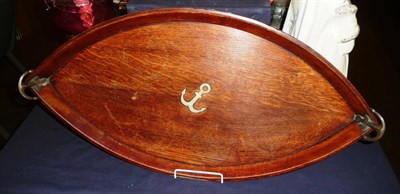 Lot 133 - A boat shaped twin handled tray decorated with an anchor