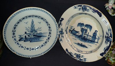 Lot 144 - An 18th century blue and white Delft bowl decorated with a figure and a pagoda, and a plate...