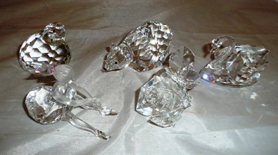 Lot 148 - Assorted Swarovski crystal animals including; a swan marked with a swan and Swarovksi, polar...