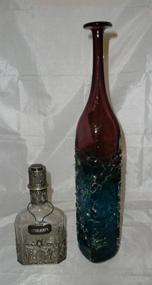 Lot 176 - Continental white metal mounted decanter and a tall coloured glass bottle vase