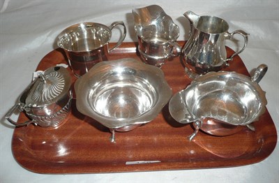 Lot 178 - Two silver cream jugs, silver sauce boat, sugar bowl, mustard and a small jug, 17oz