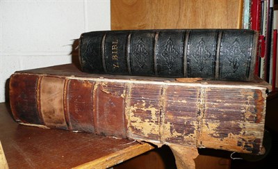 Lot 180 - Two leather bound bibles