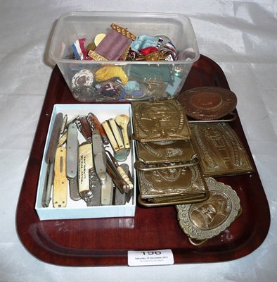 Lot 196 - A quantity of collectors items including penknives, brass belt buckles, assorted enamel badges etc