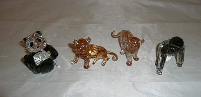 Lot 200 - Swarovski crystal seated panda, seated and standing tigers and a gorilla (all boxed) and marked...