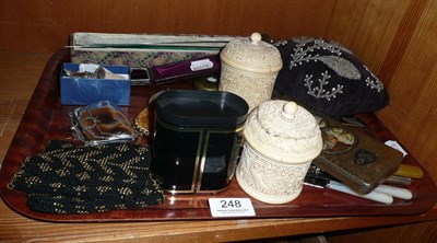 Lot 248 - A tray of hat pins, cutlery, stick pins, beaded cushion, etc