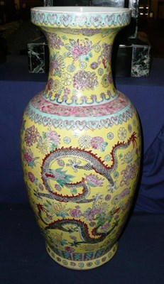 Lot 258 - A Chinese porcelain yellow ground baluster vase