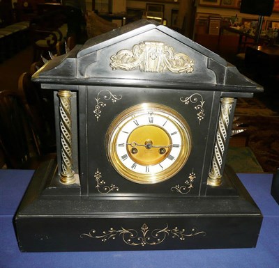 Lot 269 - Black slate clock with brass column J Dent, Kendal