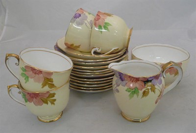 Lot 279 - A twelve piece hand-painted tea set