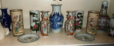 Lot 296 - A pair of Chinese famille rose vases, a large Chinese baluster vase with blue and white decoration