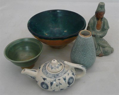 Lot 334 - Two trays of assorted Eastern pottery including bowls and figures, etc