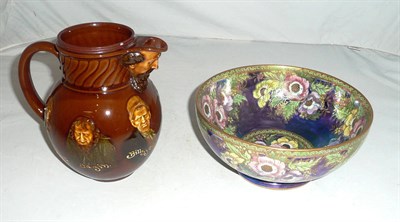 Lot 33 - A Royal Doulton Kingsware 'Dickens' jug and a Maling bowl