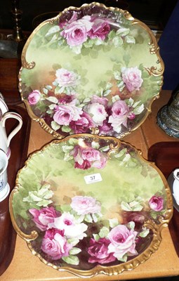 Lot 37 - A pair of Limoges green and floral plates