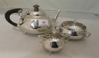 Lot 56 - Silver three piece tea set, 23oz