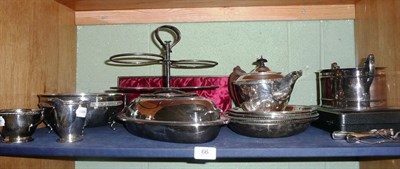 Lot 66 - A plated teapot with matching milk jug and sugar bowl and a quantity of plated items including...
