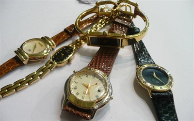Lot 85 - Four Gucci lady's wristwatches and a Raymond Weil wristwatch (5)