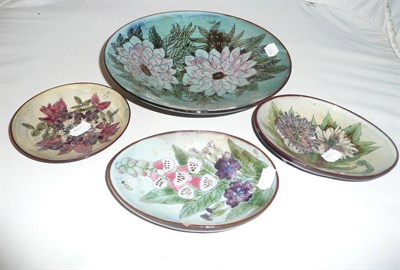 Lot 115 - Chelsea Pottery large blue and floral bowl and three similar smaller dishes
