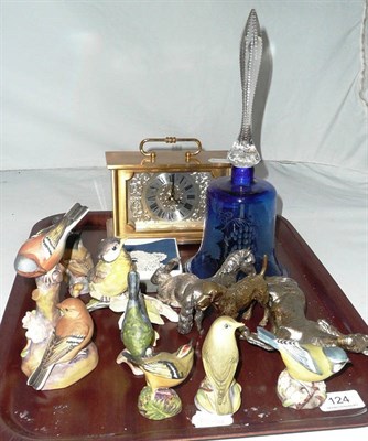 Lot 124 - Six Royal Worcester bird figures and a Goebels example, a blue glass bell, a mantel timepiece,...