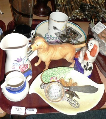 Lot 132 - A tray including Poole plate and bowl, Beswick dog, silver strainer, etc