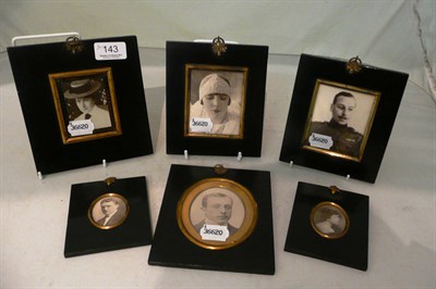 Lot 143 - Six 19th century black papier-mache miniature frames (containing photographs)
