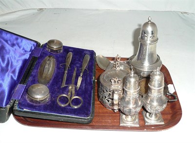 Lot 167 - A tray of silver including Victorian mustard, manicure set, silver sifter, etc