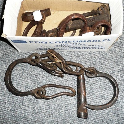 Lot 169 - Two pairs of slave shackles and handcuffs (4)