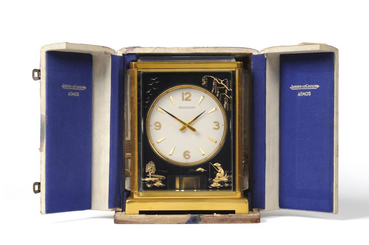 Lot 849 - An Atmos Clock, signed Jaeger LeCoultre, model: Marina Chinese harbour, 20th Century, black perspex