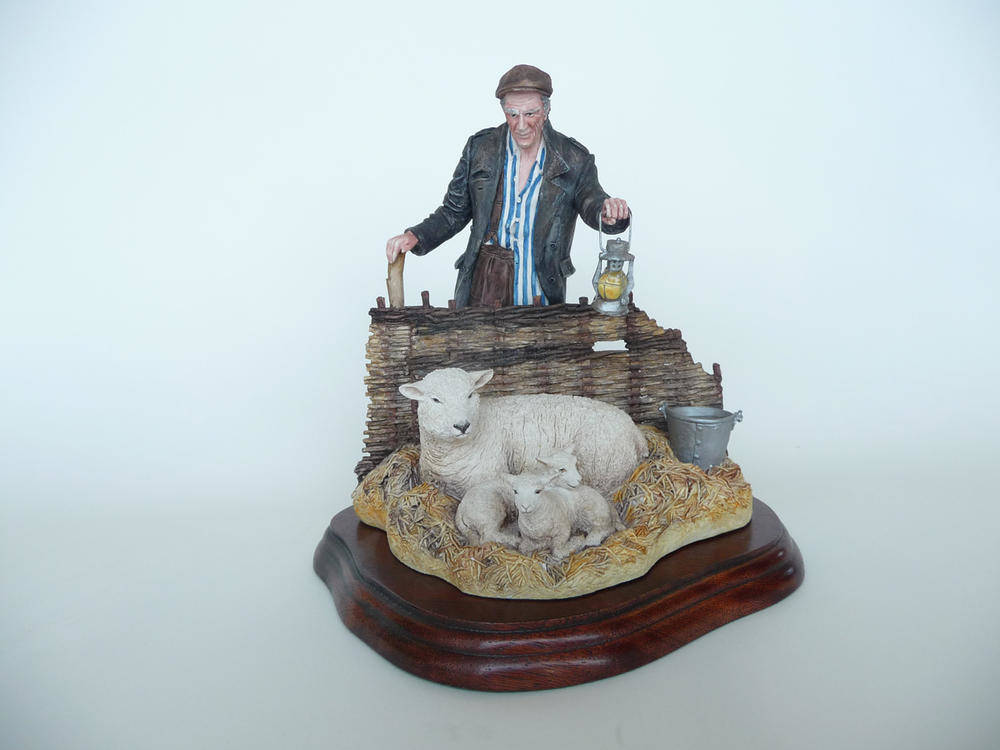 Lot 1032 - Border Fine Arts Shepherd with Ewe and Lambs 'A Pair for the Royal', model No. B0580 by Kirsty...