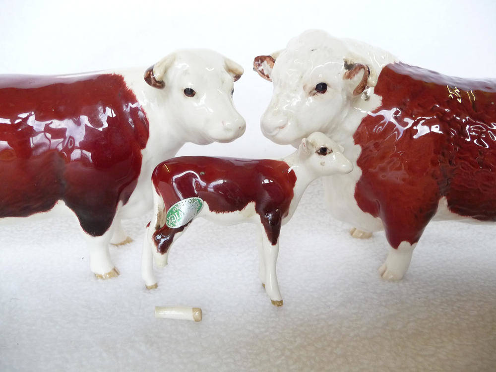 Lot 1075 - Beswick Hereford Bull, model No. 1363A, 10.8cm high; Hereford Cow, model No. 1360, 10.8cm high...