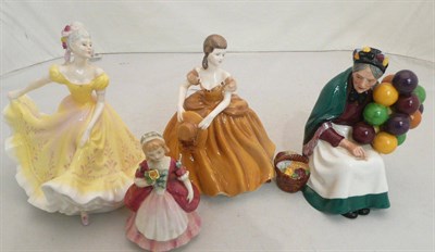Lot 22 - Three Royal Doulton figures 'Valerie', 'The Old Balloon Seller' and 'Nanette' and a Coalport figure
