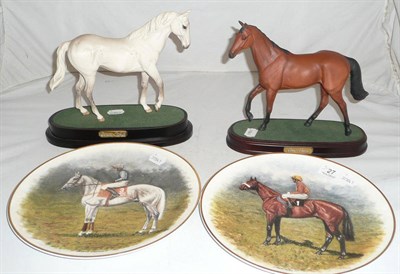 Lot 27 - Two Royal Doulton bisque figures of Red Rum and Desert Orchid and a pair of Peter Deighan plates
