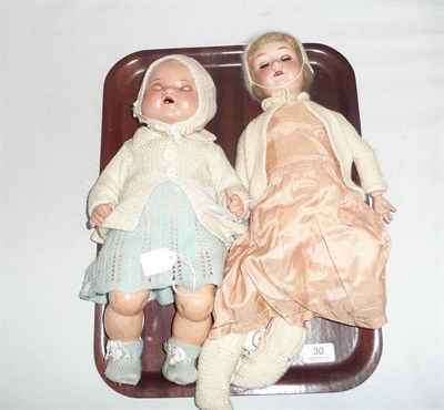 Lot 30 - An Armand Marseille 390 bisque socket head doll and a composition head doll (2)