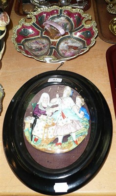 Lot 41 - A Vienna hors d'ouevres dish and a Continental glazed relief plaque of three figures