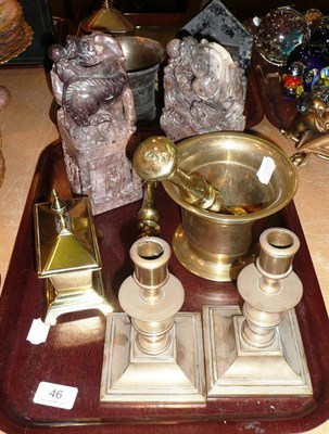 Lot 46 - Two carved soapstone groups, brass pestle and two mortars, pair of squat candlesticks and a tobacco