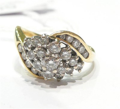 Lot 59 - A diamond cluster ring on an 18ct gold shank
