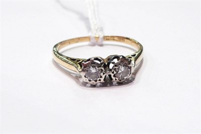 Lot 70 - A two stone diamond ring with 18ct gold shank