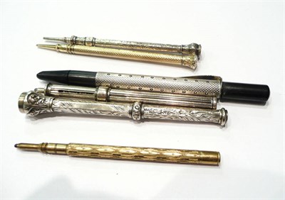 Lot 75 - Two silver Sampson & Morden propelling pencils, a yellow metal example and three others