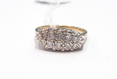 Lot 101 - A ten stone diamond gold set ring