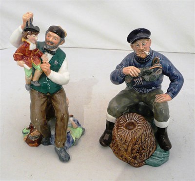 Lot 104 - Two Royal Doulton figures 'The Lobster Man' HN2317 and 'The Puppetmaker' HN2253
