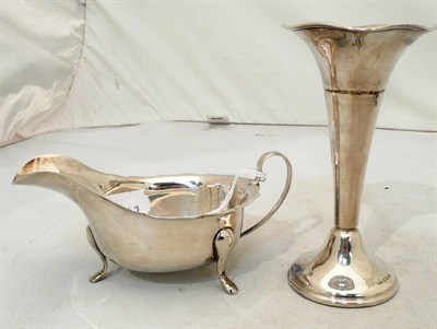 Lot 121 - Silver sauce boat (3oz) and a silver trumpet vase (loaded)