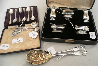 Lot 138 - A cased silver condiment set of six pieces, a cased set of six silver coffee spoons, a set of...