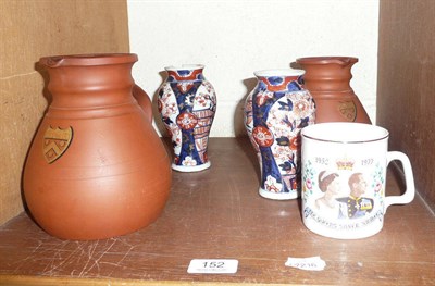 Lot 152 - Two Wedgwood graduated terracotta jugs with painted armorials, a pair of small Imari vases and...