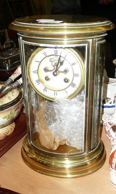 Lot 164 - French brass and glass-cased mantel clock