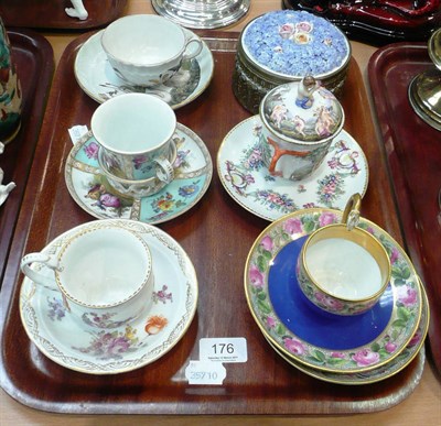 Lot 176 - Tray including five Continental decorative cups and saucers and a German gilt metal mounted...